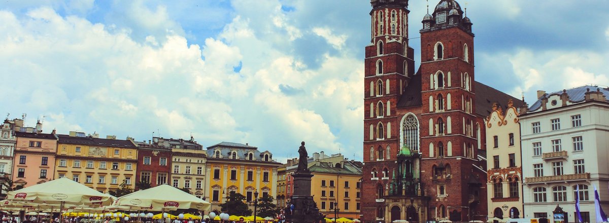 Decorative element complementing the call by showing Krakow city centre